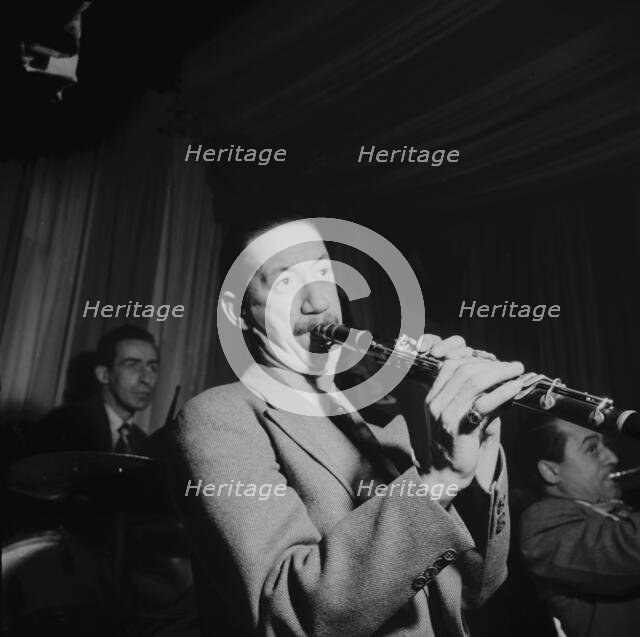 Portrait of Pee Wee Russell, Dave Tough, and Max Kaminsky, Eddie Condon's, New York, N.Y., 1946. Creator: William Paul Gottlieb.