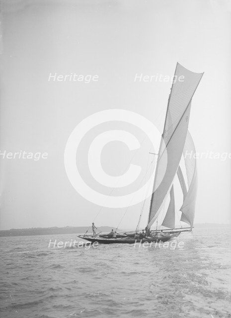 The 45 ton cutter 'Varia' under sail, 1911. Creator: Kirk & Sons of Cowes.