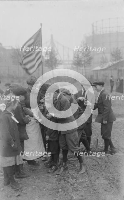 Seed distribution, Rockefeller Garden, 1917. Creator: Bain News Service.