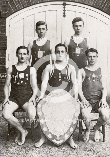 Rowntree boys life-saving team pose with the Faber Life-Saving Trophy, 1912. Artist: Unknown