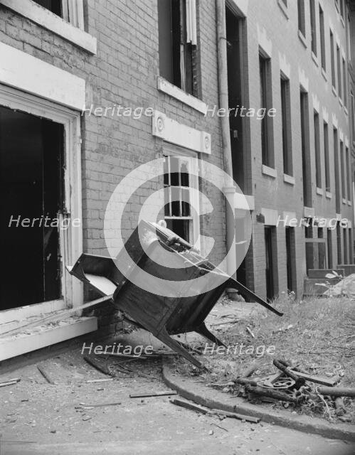 Exteriors of houses being wrecked on Independence Avenue, Washington, D.C, 1942. Creator: Gordon Parks.