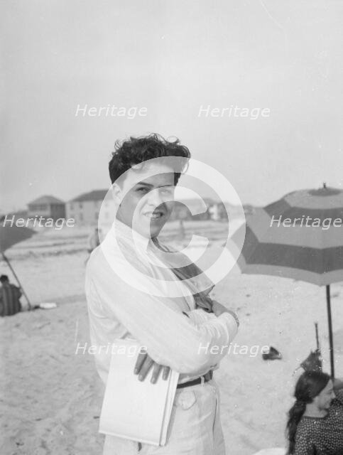 Unidentified member of the Albert Rothbart group at the beach, between 1920 and 1935. Creator: Arnold Genthe.