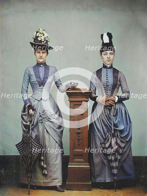 Studio Portrait of Two Women Holding Folded Parasols, ca. 1885. Creator: Unknown.