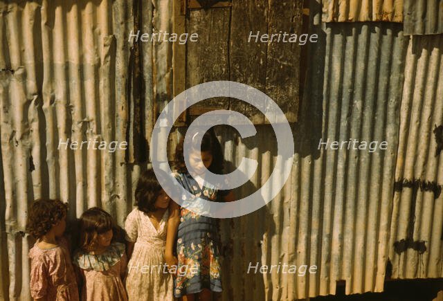 Children in a company housing settlement, Puerto Rico, 1941. Creator: Jack Delano.