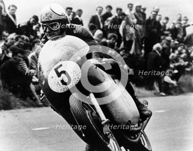 Mike Hailwood, on an MV Agusta, winner of the Isle of Man Senior TT, 1964. Artist: Unknown