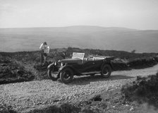 Kitty Brunell road testing a Riley 9 WD tourer, c1930. Artist: Bill Brunell.