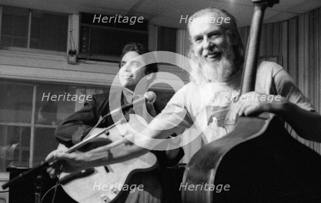 Peter Ind (bass) and Howard Alden, Tenor Clef, Hoxton Sq, London, July, 1992. Creator: Brian O'Connor.