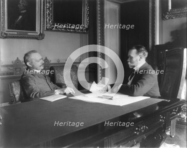 Jules Martin Cambron, 1845-1935, and John Milton Hay, 1838-1905, at exchange..., c1899 May 4. Creator: Unknown.