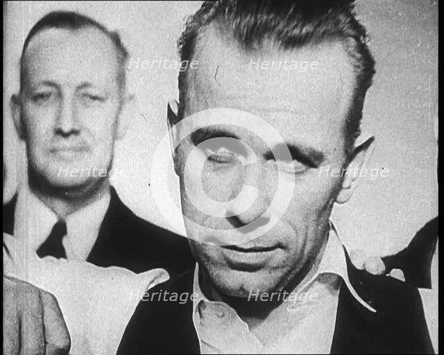 American Gangster John Herbert Dillinger Behind Bars, 1930s. Creator: British Pathe Ltd.