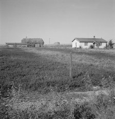 The Emmett Smith house, one of the best of the flat, Dead Ox Flat, Malheur County, Oregon, 1939. Creator: Dorothea Lange.