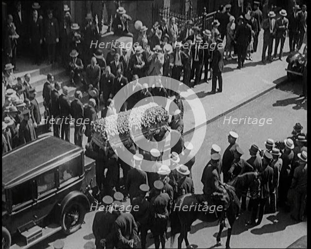 The Coffin of Rudolph Valentino Being Carried Into Malachy's Church Actor's Chapel..., 1926. Creator: British Pathe Ltd.
