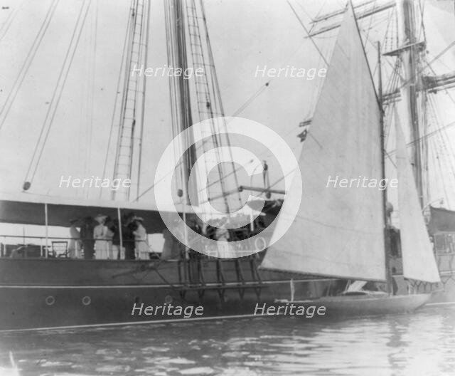 Presidential yacht at Oyster Bay, L.I., 1905: guests standing amid ships, 1905. Creator: Frances Benjamin Johnston.