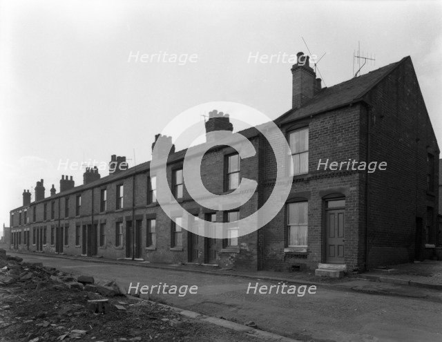 Traditional terraced housing, Albert Road, Kilnhurst, South Yorkshire, 1959. Artist: Michael Walters