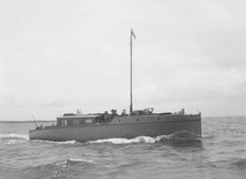 The motor yacht 'Cygnet' under way, 1922. Creator: Kirk & Sons of Cowes.