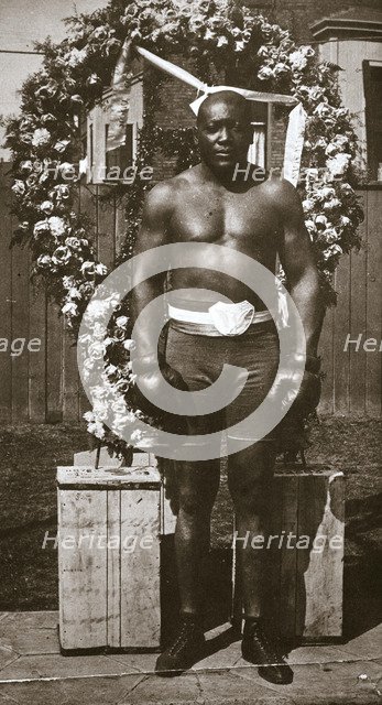 Jack Johnson, American boxer, 1910. Artist: Unknown