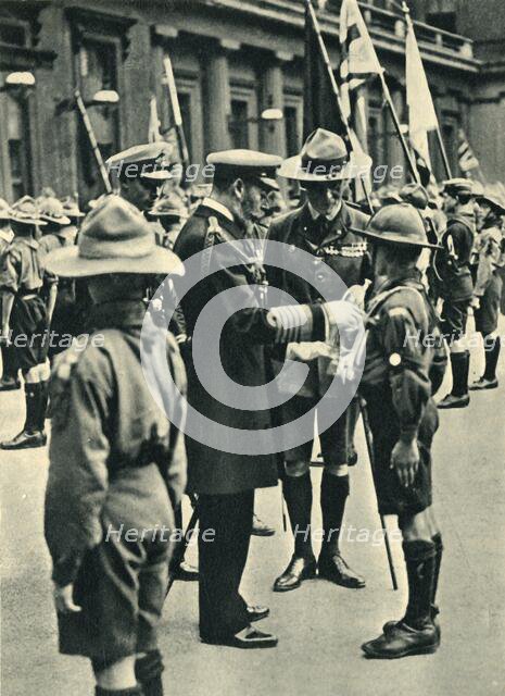 'King George V with Lord Baden-Powell Inspecting Boy Scouts, 1920', 1944. Creator: Unknown.