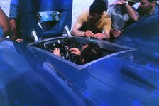 Donald Campbell in Bluebird CN7 cockpit at Lake Eyre 1963, Ken Norris on right. Creator: Unknown.