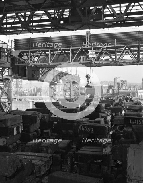 Eectromagnet above steel ingots, Park Gate Iron & Steel Co, Rotherham, South Yorkshire, 1964. Artist: Michael Walters