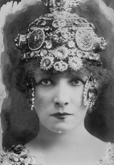 S. Bernhardt with elaborate headdress, 1912. Creator: Bain News Service.
