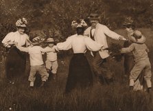 'Family playing games in a field', 1937. Artist: Unknown.