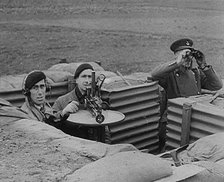 Three Royal Observer Corps Members in a Lookout Post, 1940. Creator: British Pathe Ltd.