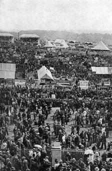 Crowds on Derby Day, Epsom Downs, Surrey, c1922. Artist: Horace Walter Nicholls