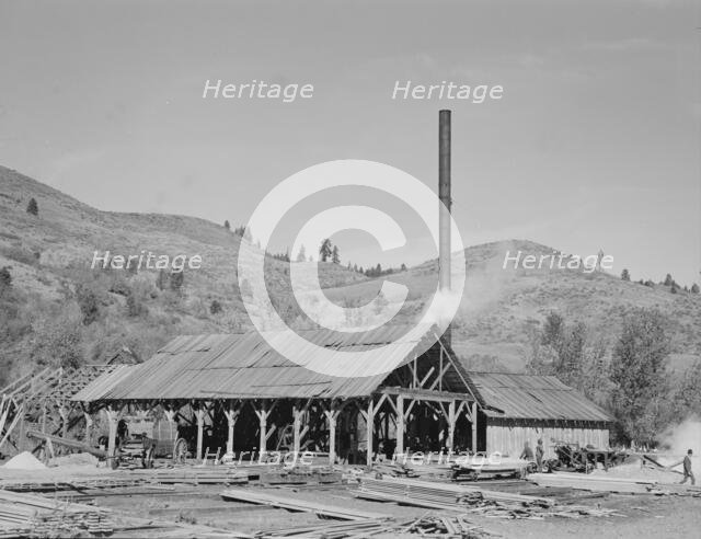 Possibly: The sawmill, Ola self-help sawmill co-op, Gem County, Idaho, 1939. Creator: Dorothea Lange.