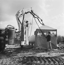 A view of welding taking place along the Fens gas pipeline, Norfolk, 10/08/1967. Creator: John Laing plc.