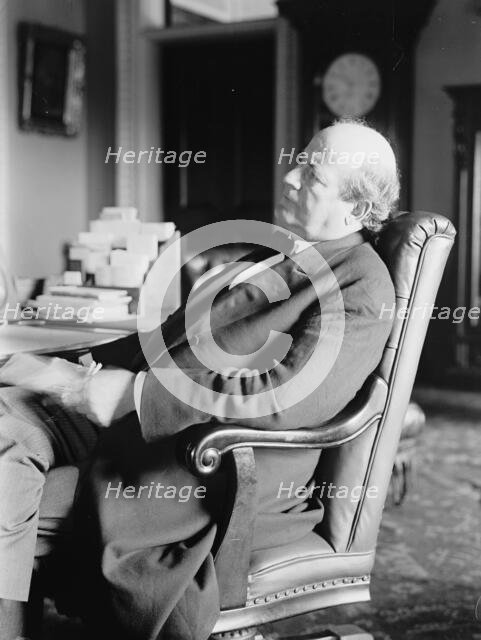William Jennings Bryan, Rep. from Nebraska, at desk, 1914. Creator: Harris & Ewing.
