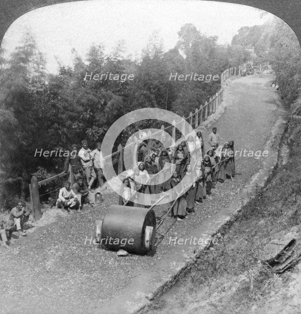 A woman work team on the Darjeeling highway, India, 1903.Artist: Underwood & Underwood