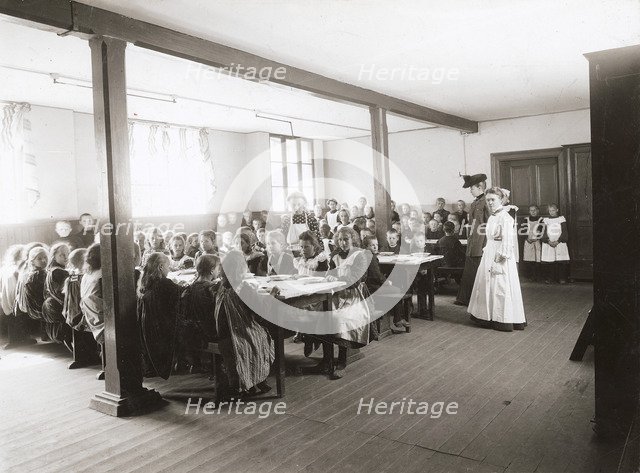 Poor children are served free meals in the refectory, Albano school, Landskrona, Sweden, 1906. Artist: Unknown