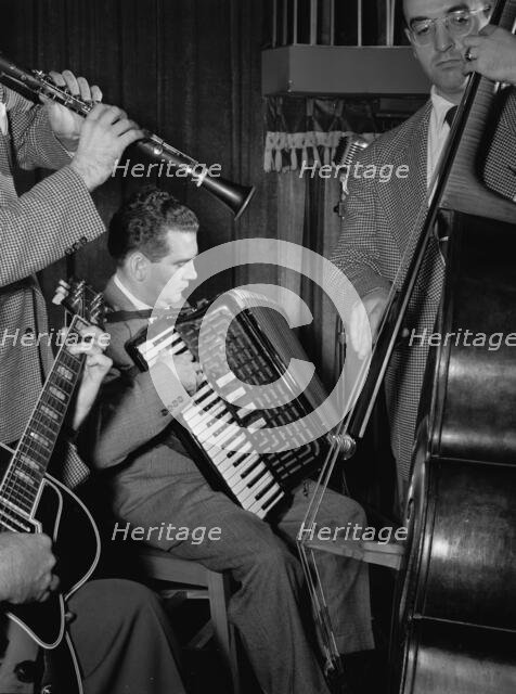 Portrait of Joe Mooney, Gaeton (Gate) Frega, and Andy Fitzgerald, Eddie Condon's, N.Y., 1947. Creator: William Paul Gottlieb.