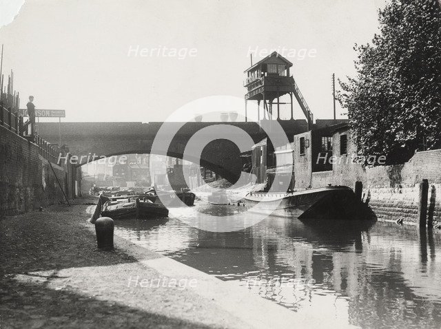 Limehouse Cut looking south from Commercial Road, Stepney, London, c1925. Artist: Unknown