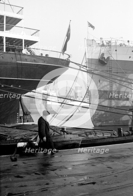Ships berthed at the Royal Albert Dock, Canning Town, London, c1945-c1965. Artist: SW Rawlings