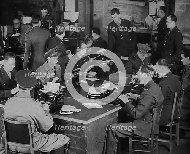 Uniformed Press Officers Working, 1943. Creator: British Pathe Ltd.