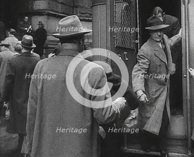 Men Exiting a Van, 1942. Creator: British Pathe Ltd.