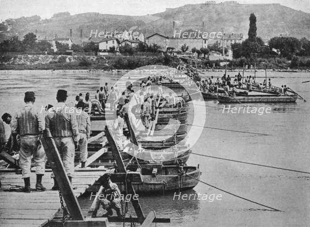 'Building a pontoon bridge over a French stream', 1915. Artist: Unknown.