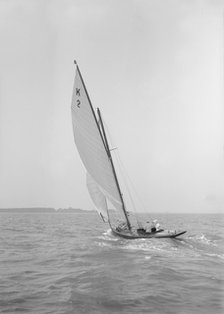 The 7 Metre class yacht 'Ithman', 1911. Creator: Kirk & Sons of Cowes.