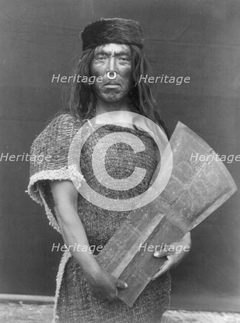 Nakoaktok chief and copper, c1914. Creator: Edward Sheriff Curtis.