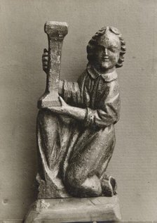 Kneeling figure with a candlestick, (1925-1930).  Creator: Unknown.