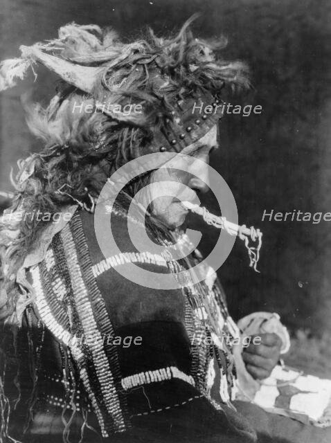 Head-dress of Matóki Society-Blood, c1927. Creator: Edward Sheriff Curtis.