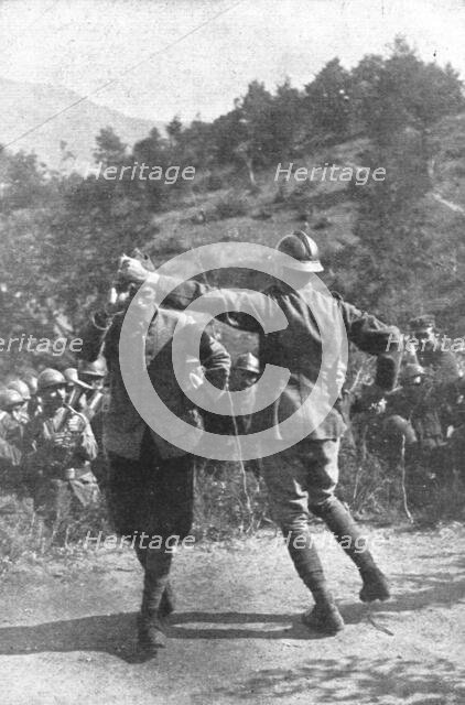 ''Sur le front d'orient; Soldats grecs celebrant par des danses la victoire franco-grec...', 1918. Creator: Unknown.