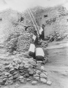 Cliff perched homes-Hopi, c1906. Creator: Edward Sheriff Curtis.