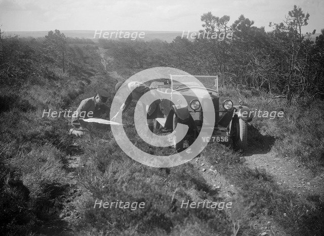 Kitty Brunell road testing a Riley 9 WD tourer, c1930. Artist: Bill Brunell.