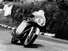 John Surtees racing an MV Agusta, 1958. Artist: Unknown