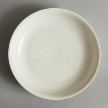 White dish with anhua design of two phoenix and cloud scroll design, Song dynasty, c.1300. Artist: Unknown.