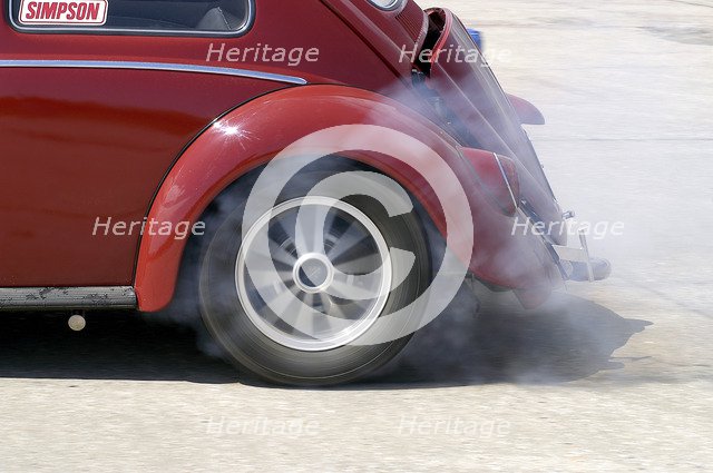VW Beetle Burning out. Artist: Unknown.
