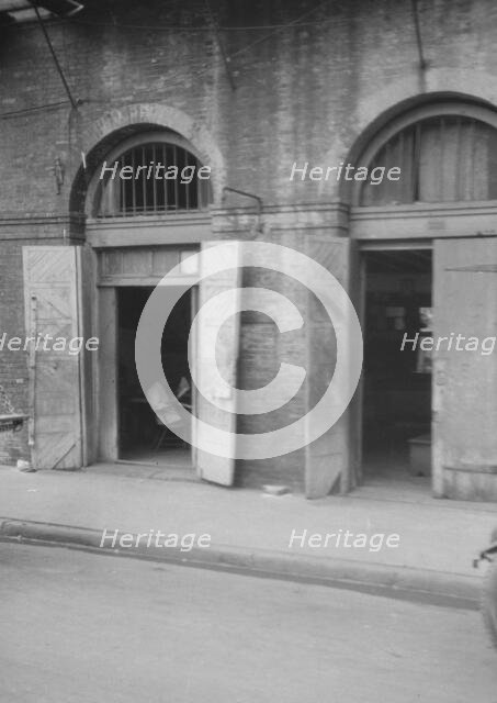 Absinthe House entrance, New Orleans, between 1920 and 1926. Creator: Arnold Genthe.