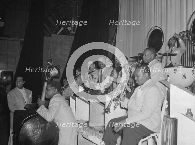 Portrait of Duke Ellington, Junior Raglin, Tricky..., Howard Theater(?), Washington, D.C., 1938. Creator: William Paul Gottlieb.