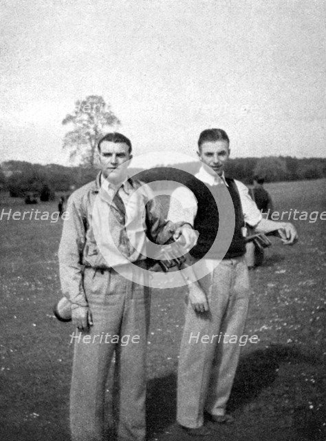Stanley Matthews and Eddie Hapgood pause between shots during a round of golf, 1945. Artist: Unknown